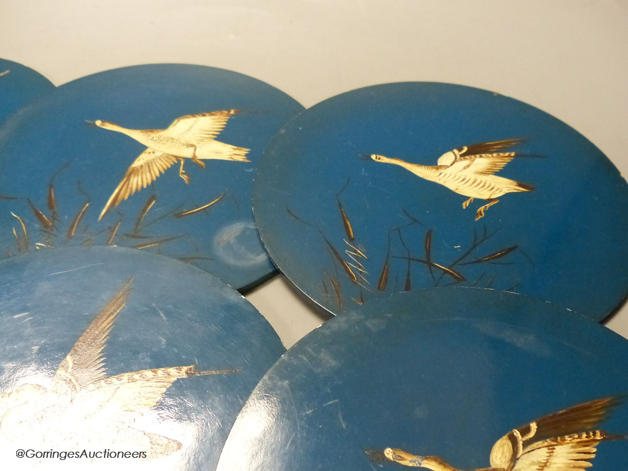 A set of six 'goose' painted coasters, diameter 20cm